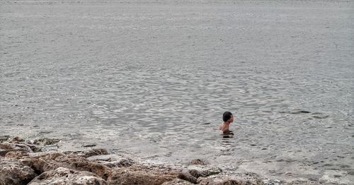 Rear view of person on beach