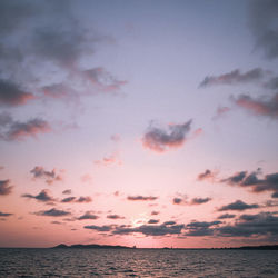 Scenic view of sea against sky at sunset
