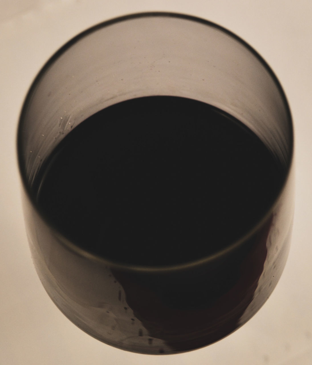 drink, refreshment, food and drink, indoors, close-up, cup, ceramic, no people, single object, black, shadow, brown, studio shot, alcohol, glass, white, circle, wine