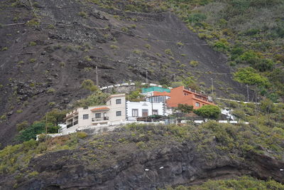 High angle view of buildings against mountain