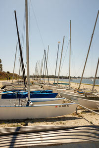 Boats moored at harbor