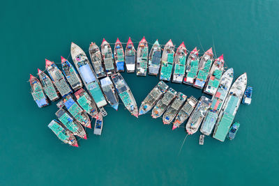 High angle view of boats moored on sea