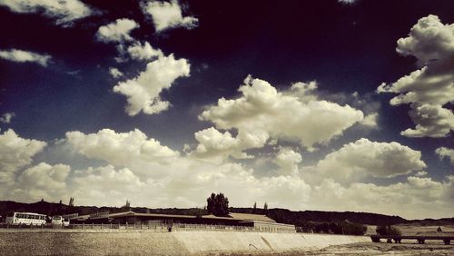 View of landscape against cloudy sky