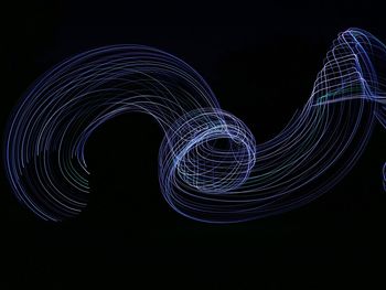 Light painting against black background