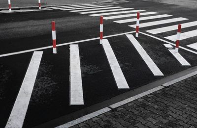 High angle view of arrow sign on road