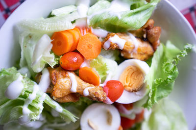 Close-up of salad served in plate on table