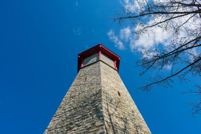 Low angle view of building against blue sky