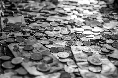 Full frame shot of coins and paper currencies