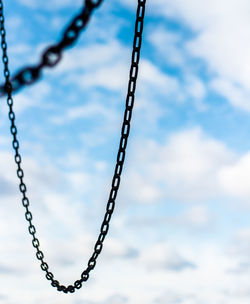 Full frame shot of crane against clouds