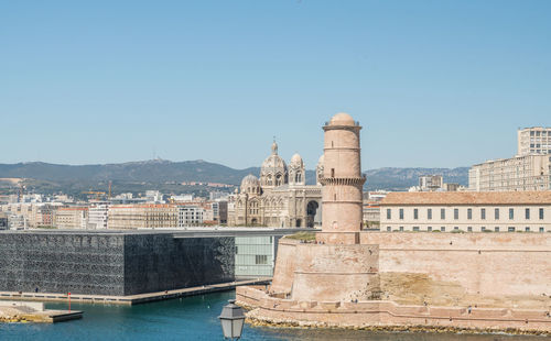 View of buildings against clear sky