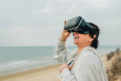 Woman looking up wearing virtual reality headset