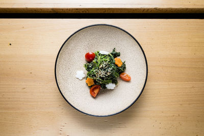 High angle view of vegetables in bowl on table