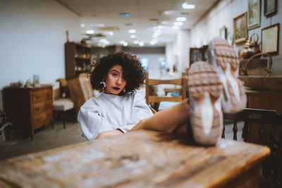 Portrait of woman sitting in restaurant