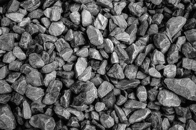 White and black pebble stones as monochromatic background