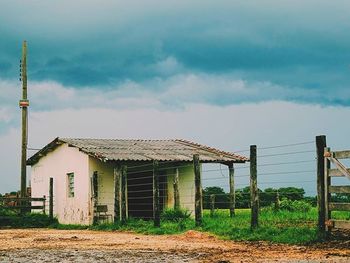 Built structure against cloudy sky