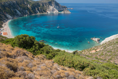 High angle view of bay against clear sky