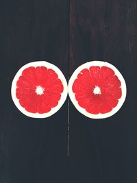 Close-up of strawberry over black background