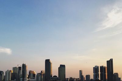 View of cityscape against sky during sunset