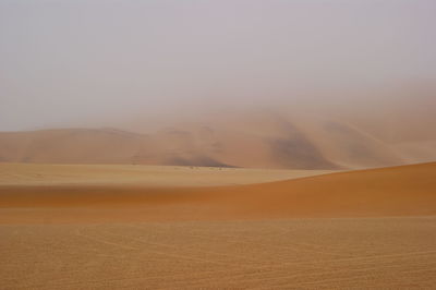 Landscape with mountain range in background