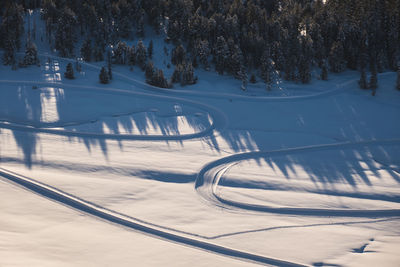 Ski lift over road during winter