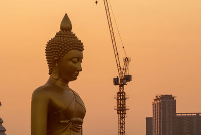 The giant golden buddha in wat paknam phasi charoen temple in phasi charoen district