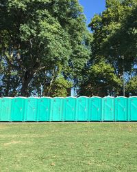 Trees on green landscape