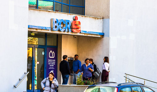 Group of people in front of building