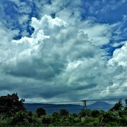 Low angle view of clouds over sea