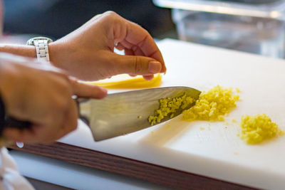Close-up of woman preparing food