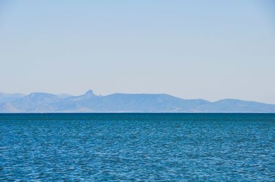 Scenic view of sea against clear sky