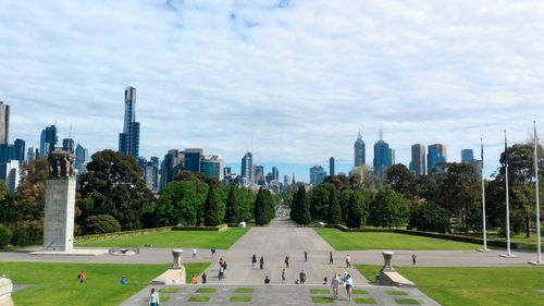 Panoramic view of park in city against sky