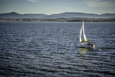 Boats sailing in sea