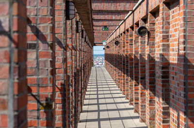 View of brick wall in city