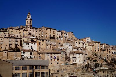 Town against clear sky