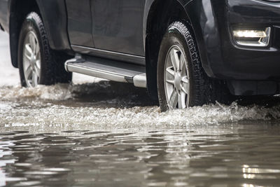 Reflection of car in water