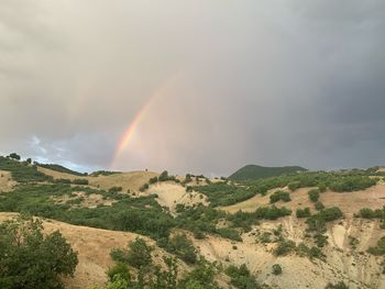 Scenic view of rainbow against sky