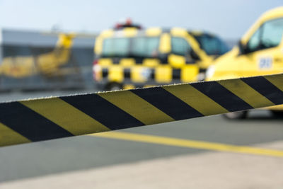 Close-up of cordon tape outdoors