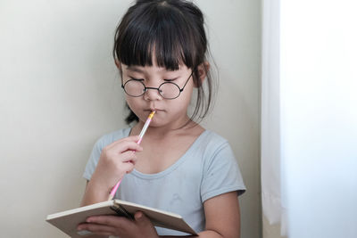 Portrait of girl looking away