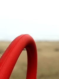 Close-up of red water on beach