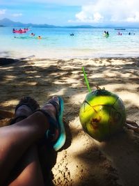 Low section of woman on beach