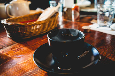 Close-up of coffee cup on table