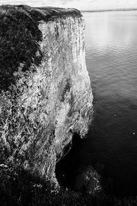 High angle view of rock formation in sea