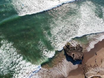 High angle view of rocks on beach