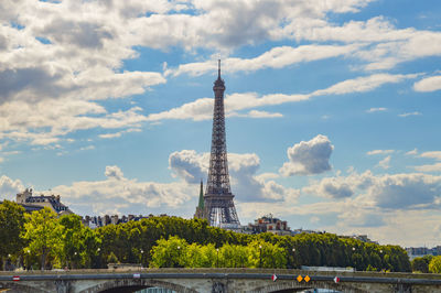 Tower against cloudy sky