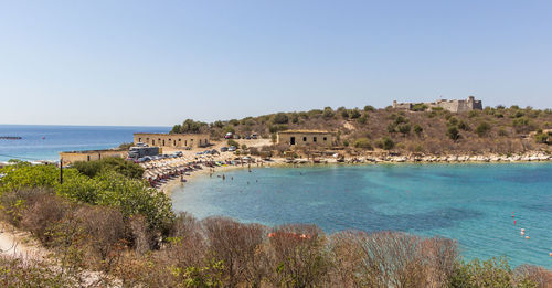 Scenic view of sea against clear blue sky