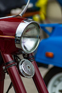 Motorcycle headlight in perspective close up photo