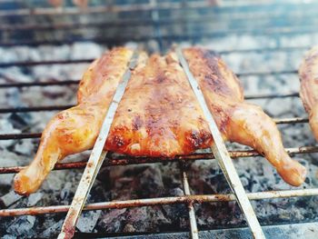 Close-up of meat on barbecue grill