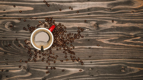 High angle view of coffee cup on table