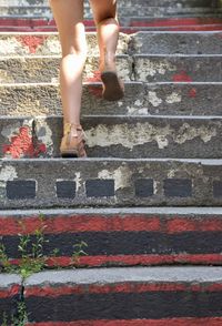 Girl climbing some stairs