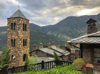 View of historic church against cloudy sky